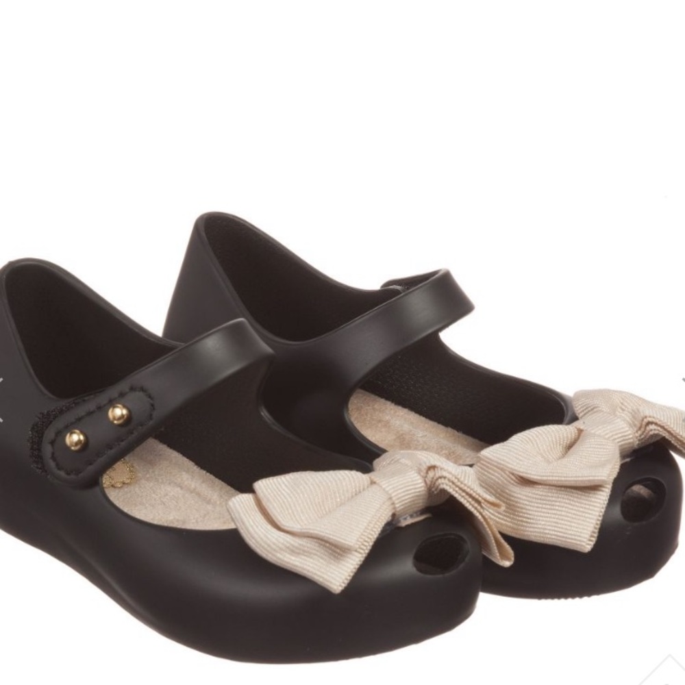 Mini Melissa black with bow. Toddler size 5.